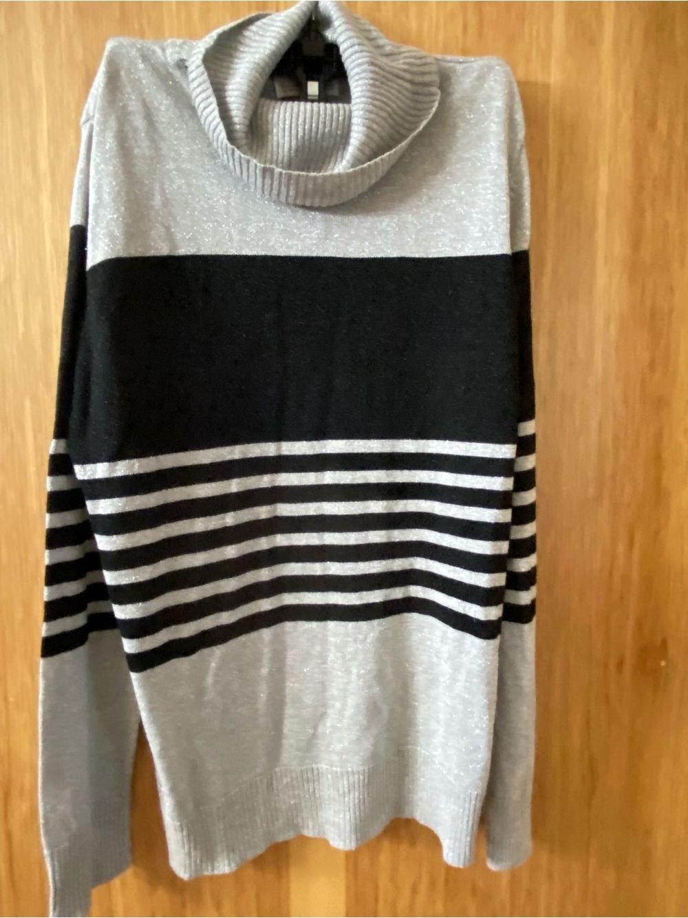 Women black and silver shimmer turtle neck sweater by Joseph A. Size L 19”p/p